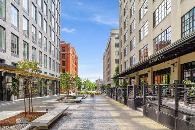 Beautiful outdoor courtyard with paved walkways and landscaping